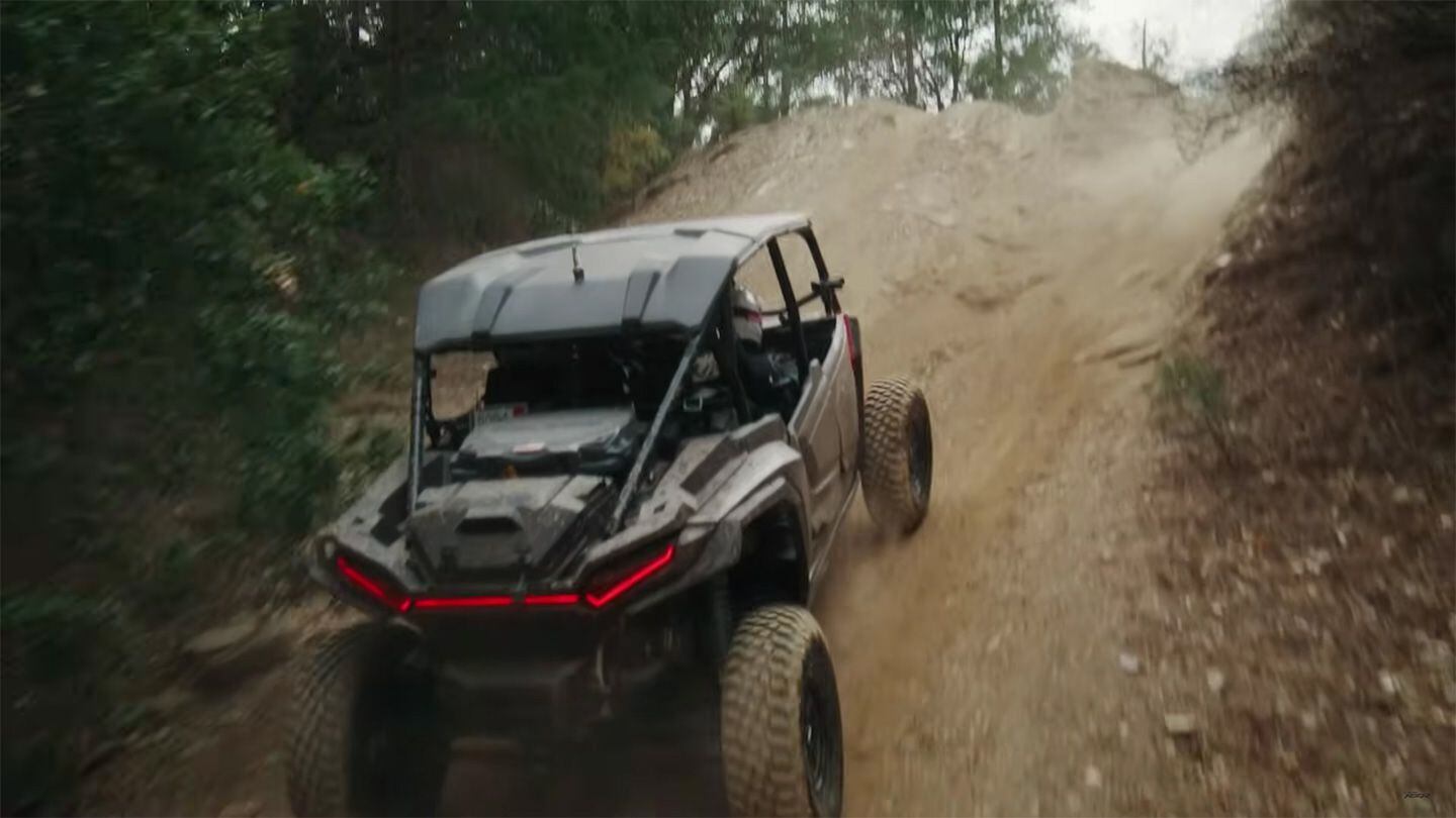 Sheckler rips off a steep climb in the Polaris RZR XP.