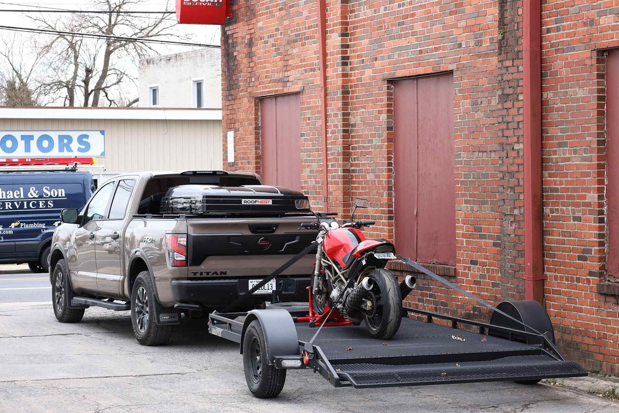 We’ve sicced our Titan on all sorts of towing duty, even when it meant towing something other than a side-by-side. Here, the big beast is picking up my Ducati from its winter service.