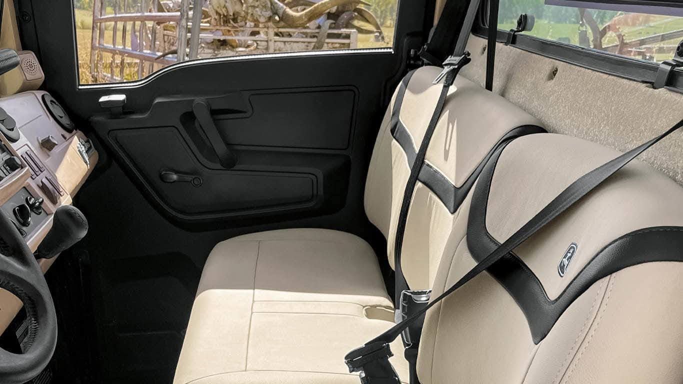 The interior gets honest-to-goodness leather seats in a 60/40 bench configuration.