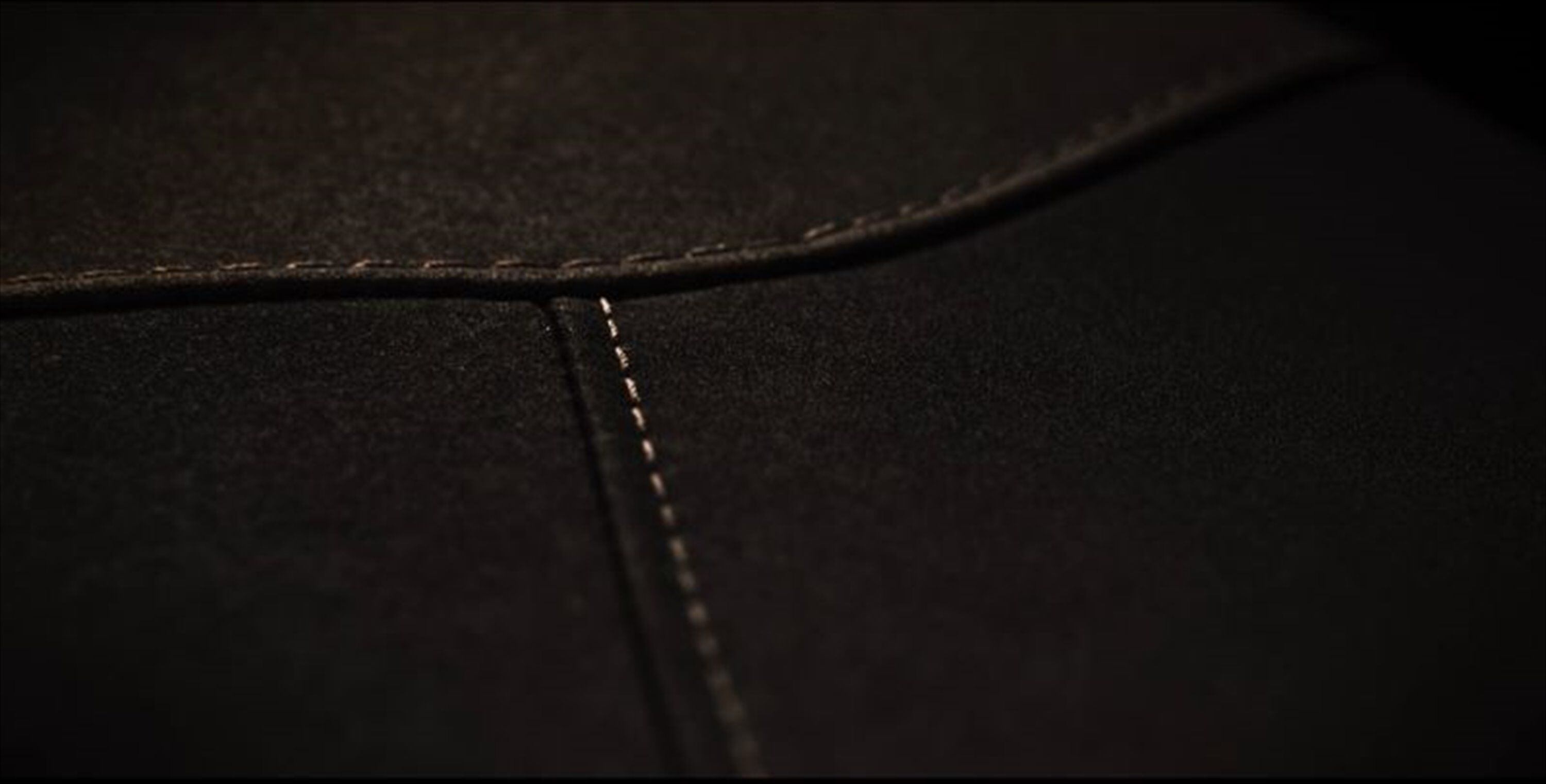 Panning interior shots show what appear to be high-quality synthetic materials in a well-appointed cabin.