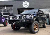 2018 lexus gx 460 parked in front of garage