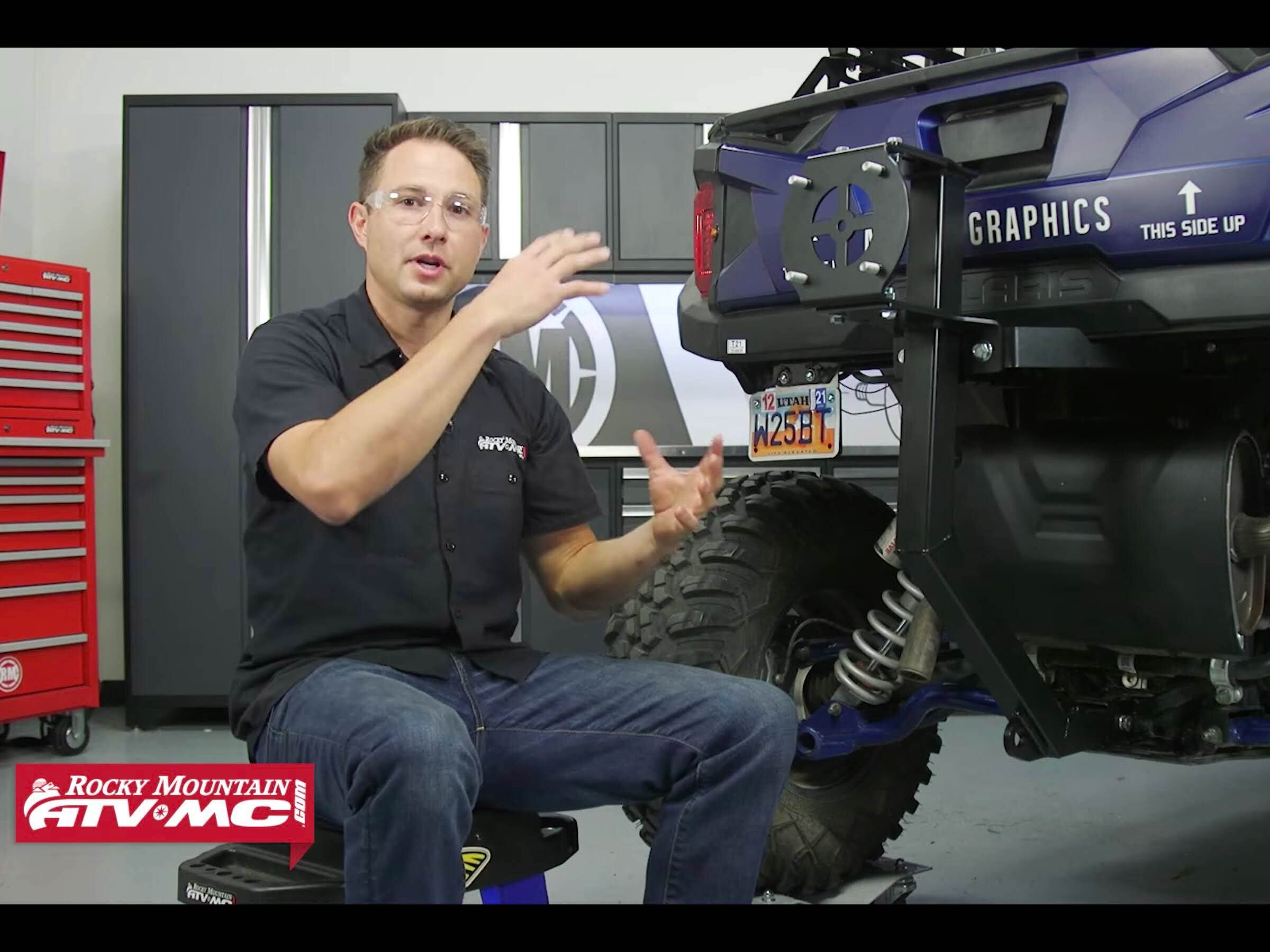 The hitch-mounted spare tire carrier is a slick bit of kit, but we wish it folded out of the way to ease cargo loading.