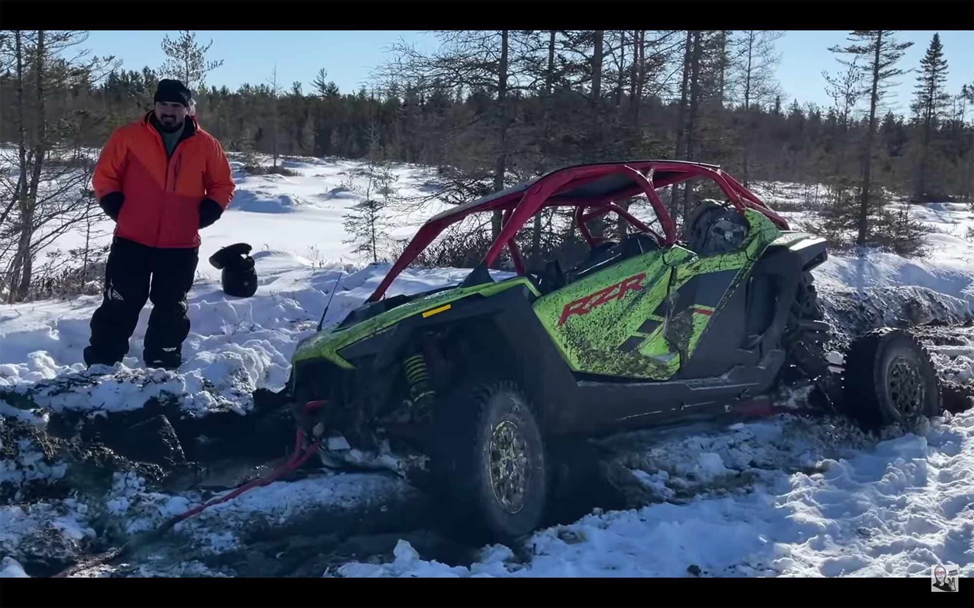 Michigan mud is sticky, even in weather 18 degrees below zero, and some pulls from a snatch strap weren’t nearly enough to get the Polaris shifted.