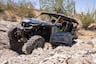 2025 Yamaha RMAX4 1000 driving on rocky trail
