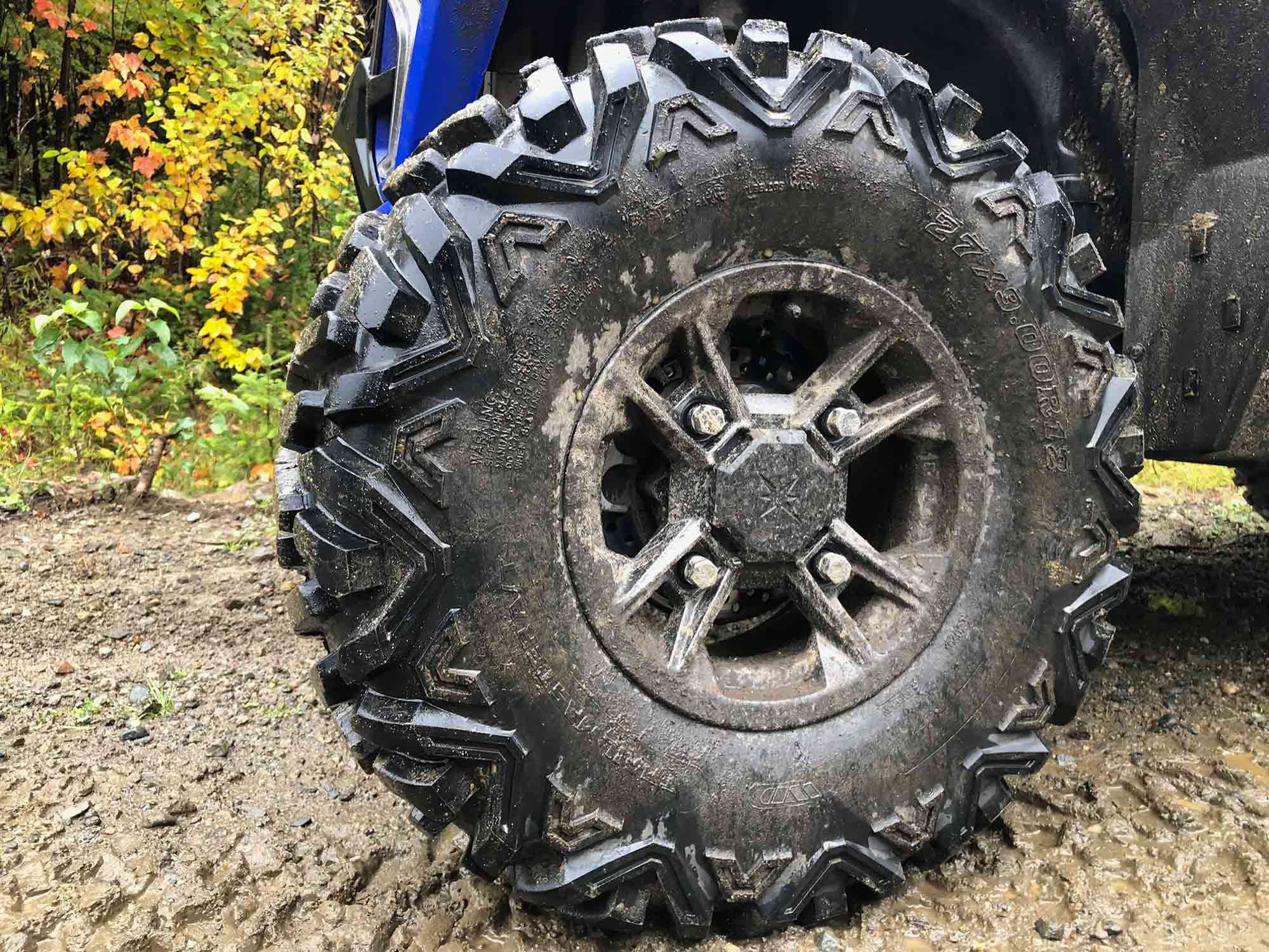 Aggressive 27-inch trail tires quickly turned into slicks when balled up with mud.